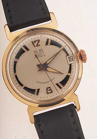 GUB HERRENARMBANDUHR, REF.-NR. 10670, DEUTSCHLAND UM 1967, METALL HARTVERG., EDEL- ST.-BODEN GEDR., HANDAUFZUGKAL. 69,1 M. DATUM,RINGUNR., ...