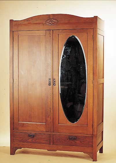 KLEIDERSCHRANK, DEUTSCH, UM 1920, EICHE MEIST MASSIV, OVALER SPIEGEL, ZWEI SOCKELSCHüBE, GESCHNITZT, 204 X 130 X 54 CM, DREI ...