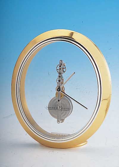 JAEGER LE COULTRE TISCHUHR OVALE, REF.-NR. 566, SCHWEIZ UM 1986, MESSING HARTVERG., LüNETTE VERS., STAB-FORMWERK M. 8-TAGELAUFZEITSTOßGES., ...