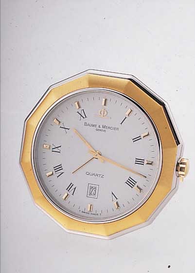 BAUME & MERCIER TISCH/REISEWECKERCHEN RIVIERA QUARTZ, REF.-NR. 130993, SCHWEIZ UM 1990, EDELST. POL., GG-LÜNETTE SAT., AUFSTELL-B., ...