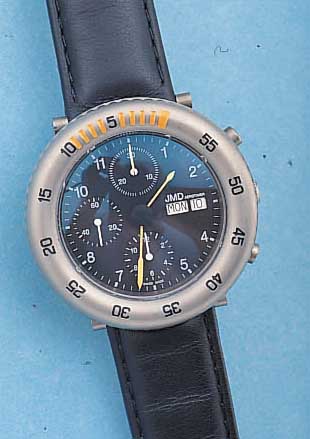 JMD ARMBANDCHRONOGRAPH AEROTIMER, REF.-NR. 2094, SCHWEIZ UM 1996, TITANGEH., ORIG.- ETUI, BED.-ANL., LEDERB. M. UNSICHTB. EDELST.-FALTSCHL., ...
