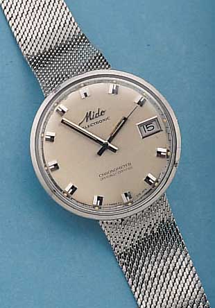 MIDO HERRENARMBANDUHR ELEKTRONIK-CHRONOMETER, REF.-NR. 7077, SCHWEIZ UM 1967, EDELST., EINSCHALENAUSF., EDELST.-FLECHTBAND, VERS. BLATT ...