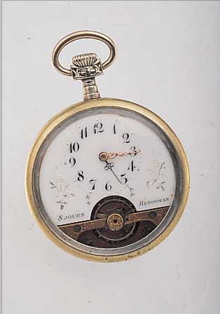 HEBDOMAS HERRENTASCHENUHR, 8-TAGEWERK, SCHWEIZ UM 1920, MESSING VERN., RüCKS. RELIE- FIERT DARST. EINES LöWEN, BER., EMAILBL., L. BESCH. ...
