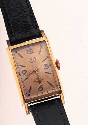 GUB HERRENARMBANDUHR, METALL-RECTANG.-GEH. HARTVERG., EDELST.-BOD. AUFGEDR., IN SICH LT. GEWöLBT, AUßER KRONE U. LEDERBD. ORIG. ZU- STAND, GR. ...