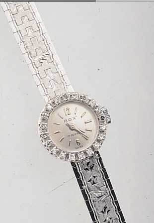 ROX DAMENGOLDBANDUHR, SCHWEIZ UM 1950, WG 750/000-GEH. RHOD., BANDGLIEDER SCHMUCK- GRAV., AUFWEND. LüNETTE M. 20 8/8 DIAMANTEN ZUS. CA. ...