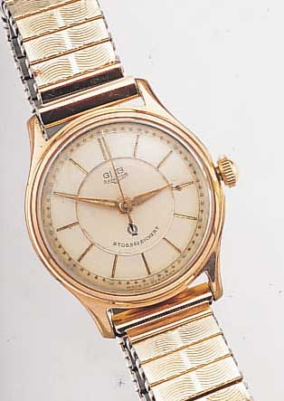 GUB HERRENARMBANDUHR GüTEKLASSE, REF.-NR. 168523, DEUTSCHLAND UM 1956, METALL ROTVERG., BER., BODEN EDELST. GESCHR., AUßER ZUGGLIEDER-B. U. ...