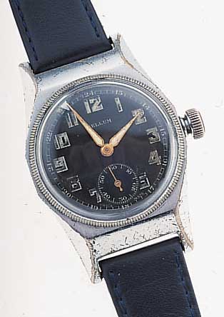 RELLUM FLIEGERARMBANDUHR, SCHWEIZ UM 1936, MASSIV METALL VERCHR., BODEN GESCHR., LüNETTE M. ZEIGER DREHB., ORIG.-BLATT, LEUCHTFARBE BRüCHIG, ...