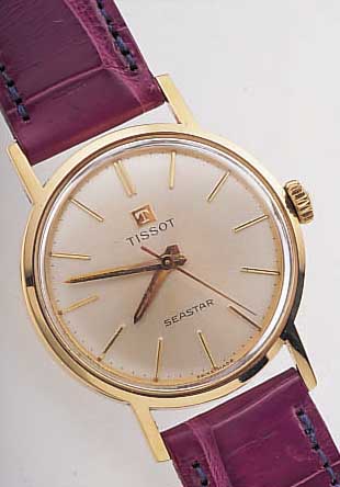 TISSOT HERRENARMBANDUHR SEASTAR, REF.-NR. 41500, SCHWEIZ UM 1968, GG 585/000, VERS. BLATT, BODEN GESCHR., BEI FERTIGST. WASSER- GESCH., 17 ...