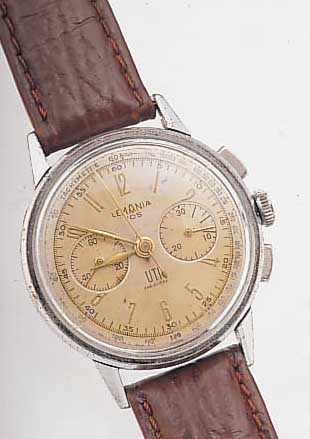 LEMANIA ARMBANDCHRONOGRAPH, REF.-NR. 105, SCHWEIZ UM 1958, METALL VERCHR., EDELST.-BODENU. GLASR. GEDR., ORIG.-BLATT FL., 30-MIN.- ...