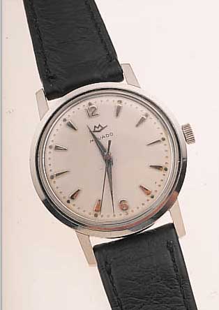 MOVADO HERRENARMBANDUHR, REF.-NR. 18341, SCHWEIZ UM 1954, EDELST., BODEN GESCHR., BLATT VERS., RUNDANKERW., 17 ST., HANDAUFZUG- KAL. 127, ...