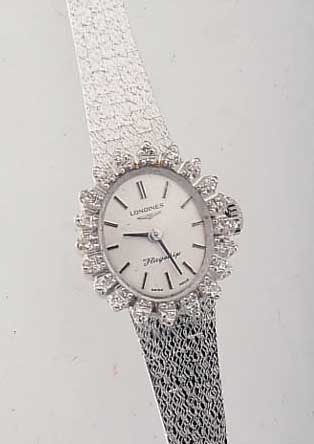 LONGINES DAMENSCHMUCKBANDUHR, SCHWEIZ UM 1972, NEUTR. WG 750/000-GEH. INCL. BAND RHOD.,OVALLüNETTE AUFWEND. M. DIAMANTBES., 20 8/8 DIAMANTEN ...