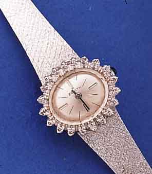 ZENITH DAMENSCHMUCKBANDUHR, SCHWEIZ UM 1972,NEUTR. WG 750/000-GEH. RHOD., MINERALFLACHGL.,M. SCHMUCKSCHL., LÜNETTE AUFWEND. M. 20 8/8 DIAMANTEN ...