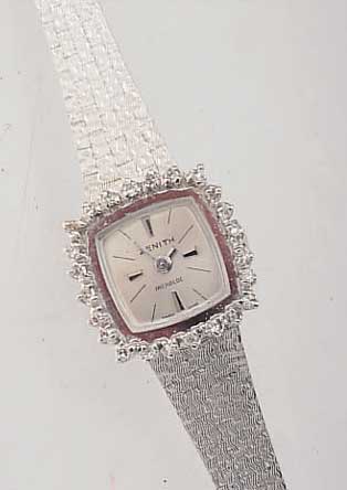 ZENITH DAMENSCHMUCKBANDUHR, SCHWEIZ UM 1970,NEUTR. WG 750/000-GEH. RHOD. INCL. BAND, Lü- NETTE AUFWEND. M. 24 8/8 DIAMANTEN ZUS. CA. 0,48 CT, ...