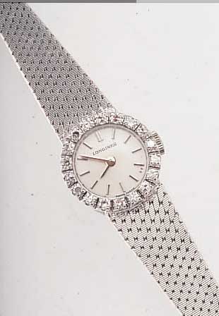 LONGINES DAMENSCHMUCKBANDUHR, SCHWEIZ UM 1972, NEUTR. WG 750/000-GEH. INCL. WG-BAND RHOD., AUFWEND. LüNETTE, 14 8/8 DIAMANTEN ZUS.CA. 0,23 ...