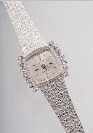 ZENITH DAMENSCHMUCKBANDUHR, SCHWEIZ UM 1972,NEUTR. WG 750/000-GEH. INCL. BAND RHOD., Lü- NETTE SEITL. M. 14 8/8 DIAMANTEN ZUS. CA. 0,23 CT, ...