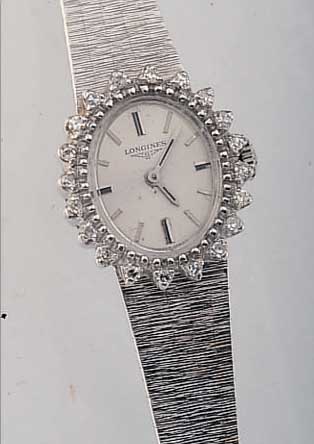 LONGINES DAMENSCHMUCKBANDUHR, SCHWEIZ UM 1970, NEUTR. WG 750/000-GEH. INCL. BAND, OVALLüNETTE AUFWEND. M. 20 8/8 DIAMANTEN ZUS. CA. 0,4 CT, ...