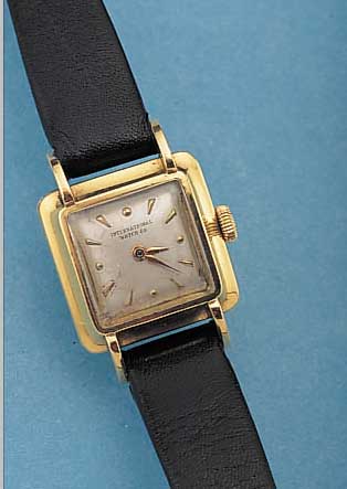 IWC DAMENARMBANDUHR, SCHWEIZ UM 1956, GG 750/000, CARREE-ARRONDEFORM, AUFGES. BANDANST.BODEN GEDR., VERS. BLATT, ALTERSBED. L. FL., FORMANKERW., ...