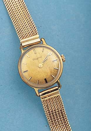 DUGENA DAMENARMBANDUHR, SCHWEIZ/DEUTSCHLAND UM 1964, METALL M. GG-AUFLAGE, EINSCHALENAUSF.NEUTR. ROSE-G. 585/000-FLECHTB., 17 ST., HAND-AUFZUGKAL. ...