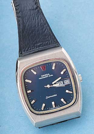 OMEGA HERRENARMBANDUHR MEGAQUARTZ/SEAMASTER, REF.-NR. 196-0023, SCHWEIZ UM 1975, EDELST. MASSIV, BODEN 4-FACH VERSCHR., MINERALFLACH- GL., ...