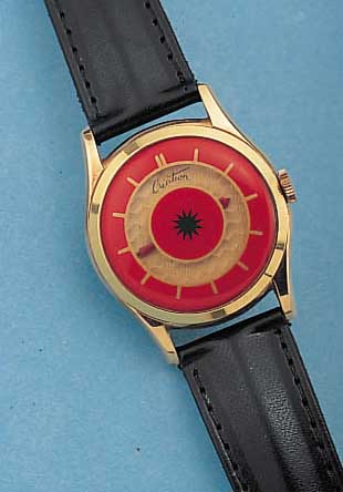 CREATION HERRENARMBANDUHR MYSTERIEUSE, SCHWEIZ UM 1957, METALL HARTVERG., BEIDS. VER-GL., ANZEIGE TEILVERD., 15 ST., RUNDANKERW., ...
