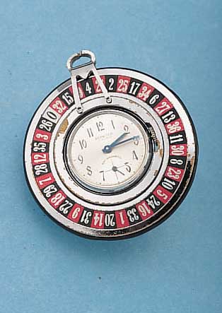 BERWITCH TASCHEN/SPIELERUHR IN FORM EINES ROULETTES, METALL VERCHR., GEH.-TEIL AUßEN KUGELGEL. DREHB., UHRINNENGEH. AUSSCHWENKB., BEIDS. ...