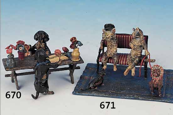 WIENER BRONZE, NACH 1950, BEMALT, 4 X 7 X 8 CM, ZWEI DACKEL AM BLUMENVERKAUFS- TISCH