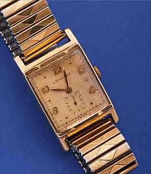 LONGINES HERRENARMBANDUHR, SCHWEIZ/USA UM 1958, GG-FILLED, BODEN GEDR., ZUGGLIEDERB. SPäTER, 17 ST., FORMANKERW., KAL. 9L, KOMP.- UNR., GEBL. ...