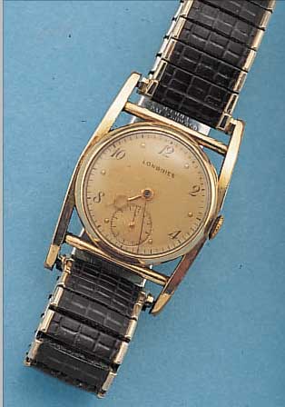 LONGINES HERRENARMBANDUHR, SCHWEIZ/USA UM 1955, GG-FILLED, BET. BANDANST., ZUGGLIEDERB.,BODEN U. GLASR. GEDR., KAL. 10L, HANDAUFZUG, SCHR.-UNR., ...