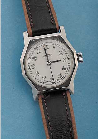 MARVIN HERRENARMBANDUHR, SCHWEIZ UM 1938, EDELST., BODEN GESCHR., BLATT REST., 15 ST., KAL. 580, SCHR.-UNR., FLACHSPIR., DECKSTEIN- STOßS., ...