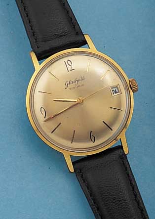 GLASHÜTTE HERRENARMBANDUHR, DEUTSCHLAND UM 1964, METALL HARTVERG., EDELST.-BODEN GEDR., 17 ST., DATUM, HANDAUFZUGKAL. 69,1, RINGUNR., FLACHSPIR., ...