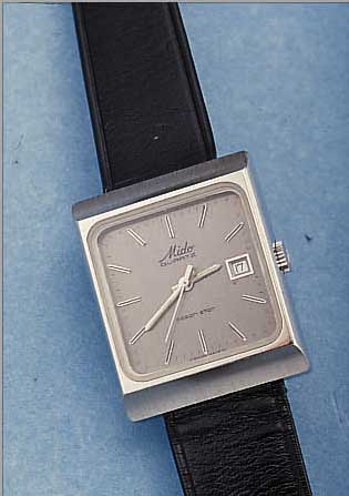 MIDO HERRENARMBANDUHR OCEAN STAR, REF.-NR. 0405, SCHWEIZ UM 1978, EDELST. POL., BODEN 4-FACH VERSCHR., MINERALFLACHGL., HIGH-TECH- QUARTZWERK M. ...