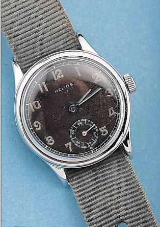 HELIOS MILITäRARMBANDUHR, REF.-NR. D14934H, DEUTSCHLAND UM 1942, METALL VERCHR., EDELST.- BODEN GESCHR., ORIG.-BLATT ALTERSBED. FARBL. GET., ...