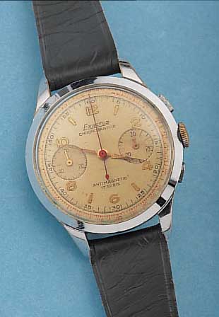 EXATUS ARMBANDCHRONOGRAPH, SCHWEIZ UM 1945, METALL VERCHR., EDELST.-BODEN U. GLASR. GEDR.,ORIG.-BLATT FARBL. GET., 30-MIN.-STOPPZäHLER, TELE- U. ...
