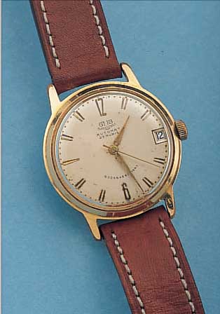 GUB HERRENARMBANDUHR AUTOMAT, REF.-NR. 65876, DEUTSCHLAND UM 1963, METALL VERG., BER., EDELST.-BODEN GEDR., ORIG.-BLATT FL., ...