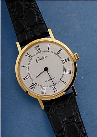 GLASHÜTTE HERRENARMBANDUHR, DEUTSCHLAND UM 1985, METALL HARTVERG., EDELST.-BODEN GEDR., EMAILFARB. KONTRASTZIFFERBL., LEDERB., DAMEN- ...
