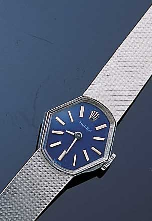 ROLEX DAMENGOLDBANDUHR, SCHWEIZ UM 1967, WG 750/000 RHOD., MINERALFLACHGLAS A. BODEN AUFGEDRüCKT, RUNDANKERWERK 18 STEINE, HAND- ...