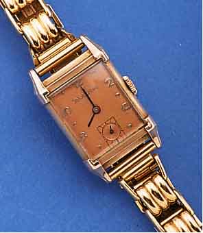 BULOVA HERRENARMBANDUHR, USA UM 1940, ROSé- GOLDFILLED, BOD. AUFGEDR., METALLGLIEDERB., USA GG-AUFLAGE, ZEITIDENTISCH, KUPFERFARBENES BLATT, ...