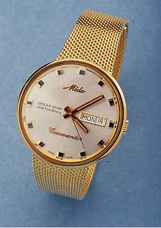 MIDO HERRENARMBANDUHR AUTOMATIC/COMMANDER, SCHWEIZ UM 1995, EDELST. INCL. FLECHTB. HART- VERG., TAG U. DATUM, ORIG. ETUI, PAP., GARAN- TIEKARTE ...