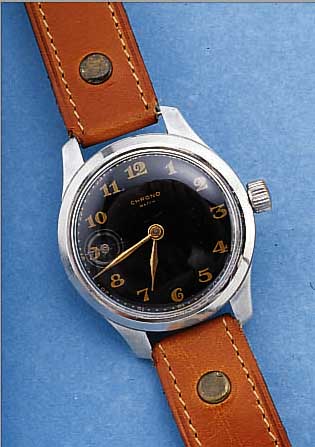 CRONO WATCH ARMBANDUHR MIT EINGEB. TASCHEN- UHRWERK, SOGEN. NOTUMBAU, UM 1946, ALU- MINIUMGEH., BOD. U. GLASR. AUFGEDR., KL. SEK. BEI ZIFFER ...