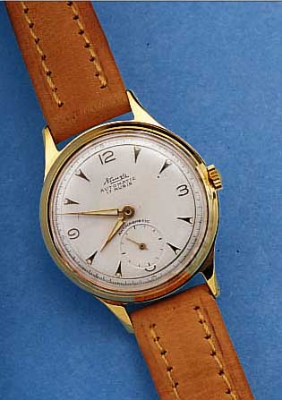 KIENZLE HERRENARMBANDUHR AUTOMATIK, DEUTSCHL. UM 1956, METALL VERG., EDELSTAHLBOD.GEDR., SOGEN. VOLKSAUTOMATIK, KAL. 57/17, 17 ST., ...