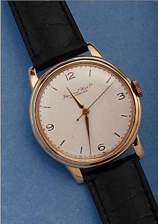 IWC HERRENARMBANDUHR, SCHWEIZ UM 1948, NEUTR. RG 750/000-GEH., BODEN GEDR., BLATT PROV. REST., RUNDANKERW., KAL. 89, HANDAUFZUG,GEPR. ...