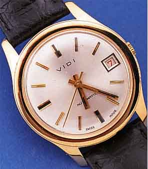 VIDI HERRENARMBANDUHR AUTOMATIK, SCHWEIZ UM 1964, GG 750/000, BODEN GESCHR., VERS. BLATT, 25 ST., ETA BASISKAL. 2452, SCHR.-UNR., FLACH-SPIR., ...
