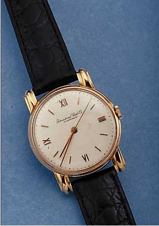 IWC HERRENARMBANDUHR, SCHWEIZ UM 1959, NEU- TR. RG 750/000-GEH. M. BET. BANDANST., BODEN U. GLASR. GEDR., REST., KAL. 89, 16 ST., ...