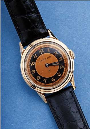 MOVADO HERRENARMBANDUHR, REF.-NR. A278504, SCHWEIZ UM 1948, EDELST., BODEN GESCHR., Lü- NETTE, SCHULTERN U. KRONE IN RG, ORIG.-BLATT ALTERSBED. ...