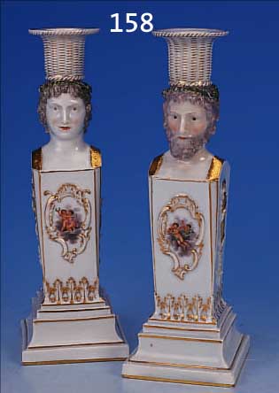PAAR KERZENLEUCHTER, MEISSEN, UM 1840/50, PORZELLAN, AUF JE EINER SäULE DARST. EINES SOG. JANUS-KOPFES, HERVORRAGENDE QUALITäT, SCHöNE ...