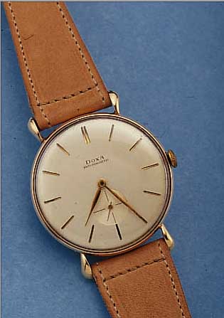 DOXA HERRENARMBANDUHR ANTIMAGNETIK, REF.-NR.450977, SCHWEIZ UM 1945, RG 585/000 M. TRO- PFENFöRM., BET. BANDANST., D. CA. 37 MM, VER- S. BLATT, ...