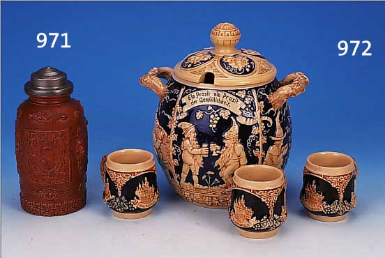 BOWLESET, GEMARKT BZ, 30/40ER J., STEINGUT, BEST. AUS BOWLE U. 8 HENKELBECHERN, WANDUNGEN REICH RELIEFIERT U. BLAU GLASIERT, UMLAUFENDERDEKOR VON ...