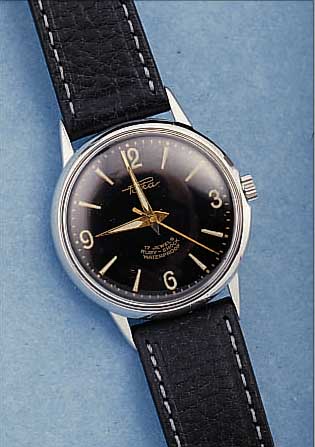 PORTA HERRENARMBANDUHR VW 100.000, DEUTSCHL. UM 1958, METALL NACHVERCHR., EDEL- STAHL, BODEN GESCHR., 17 ST., HANDAUFZUGKAL. 60 V. PUW, ...