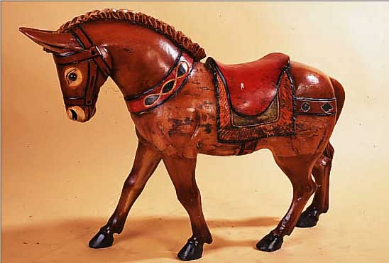 KARUSSELLESEL, WOHL FRANKREICH, MITTE 20. JH., MASS. HOLZ, BUNT GEFAßT, MIT EIN- GELEGTEN KL. SPIEGELN, L. GEBRAUCHSSPUREN, CA.78 X 110 CM