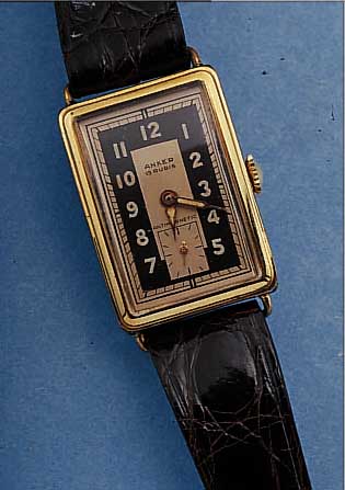 PUW HERRENARMBANDUHR, DEUTSCHLAND UM 1950, METALL VERG., EDELST.-BODEN GEDR., BEZ. ANKER, FORMANKERW., KAL. 501, MASSIV BAUWEISE,15 ST., ...
